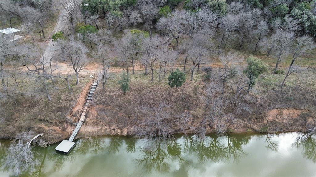 Lot 135 River Canyon Road Palo Pinto, TX 76484 - Photo 13 of 17 a aerial view of a house with a yard