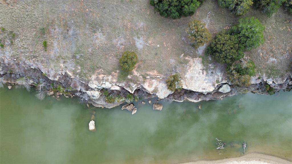Lot 135 River Canyon Road Palo Pinto, TX 76484 - Photo 9 of 17 a view of a lake from a yard