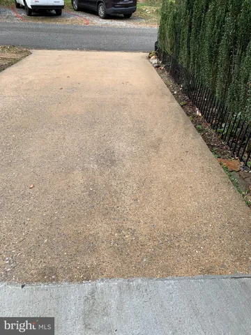 a view of a street with some trees