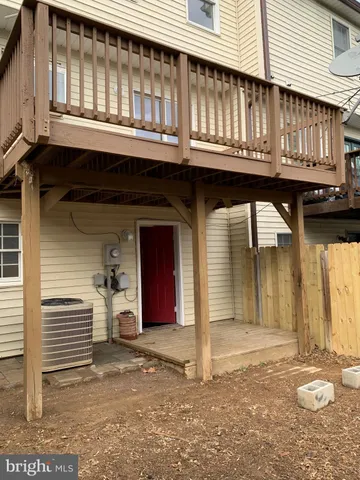 a front view of building with yard