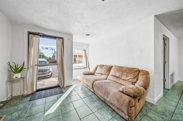 a living room with furniture and a couch