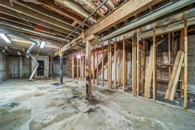 a view of under construction room and wooden fence