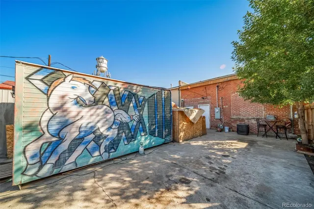 a view of a street with a building in the background