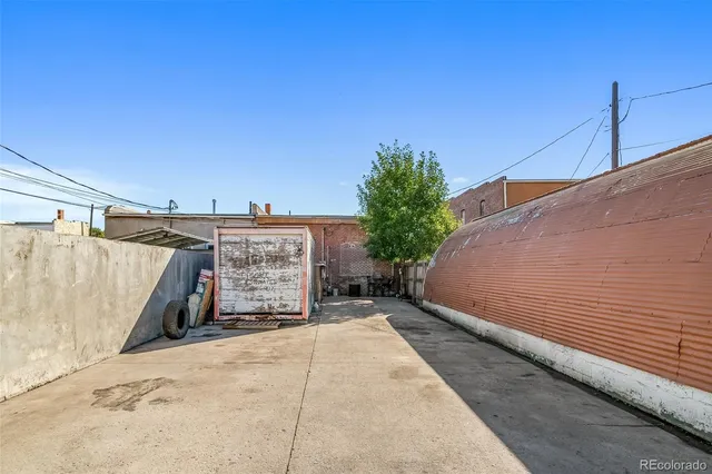 a view of a road with a building in the background