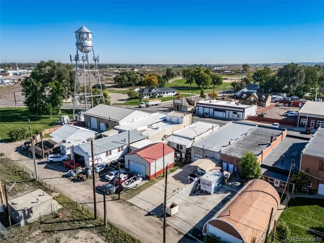 an aerial view of a yard with sitting area