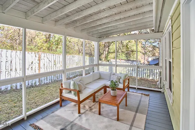 a balcony with furniture
