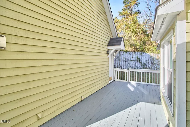 a view of a balcony with door