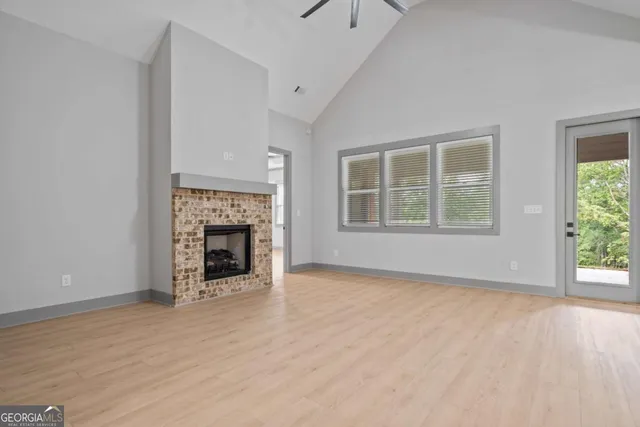 a kitchen with a sink stainless steel appliances and cabinets