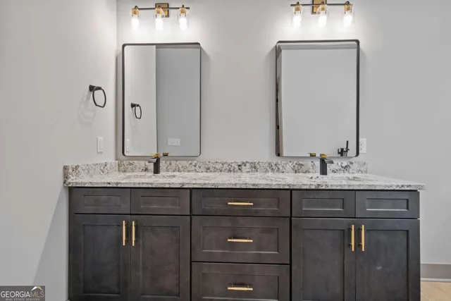 an empty room with ceiling fan and window