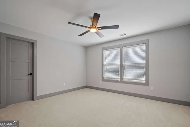 a view of a forest with a houses