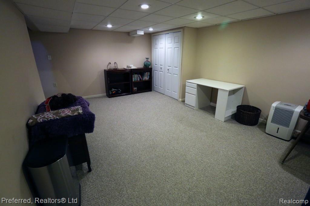 1266 Knightsbridge Road Canton, MI 48187 - Photo 22 of 22 Partial finished basement with storage.jpg