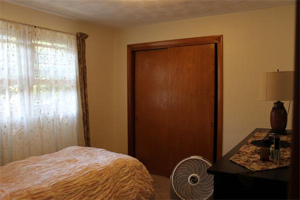 13 Woodman Road Worcester, MA 01602 - Photo 13 of 21 a bedroom with a bed and a window