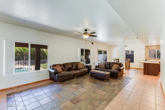 a living room with furniture and window