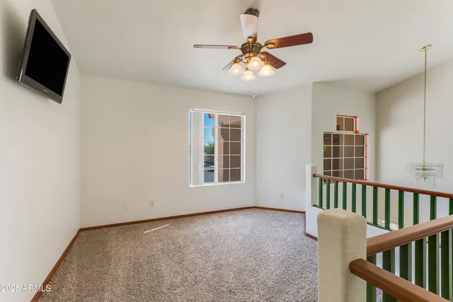 a view of livingroom with furniture and flat screen tv