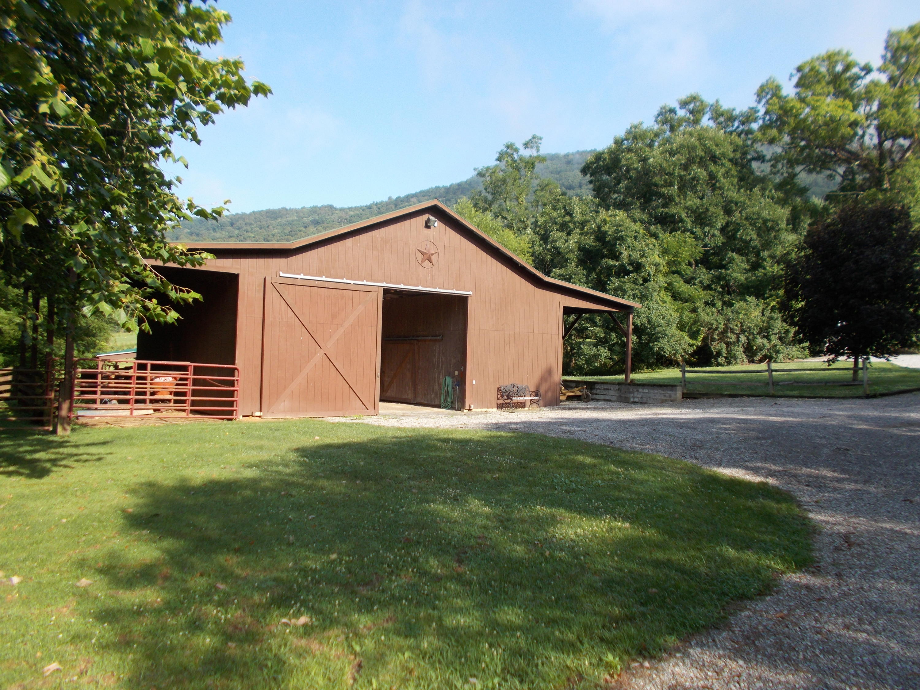 3741 Flatwoods Road Elliston, VA 24087 - Photo 3 of 51 a front view of house with yard and green space