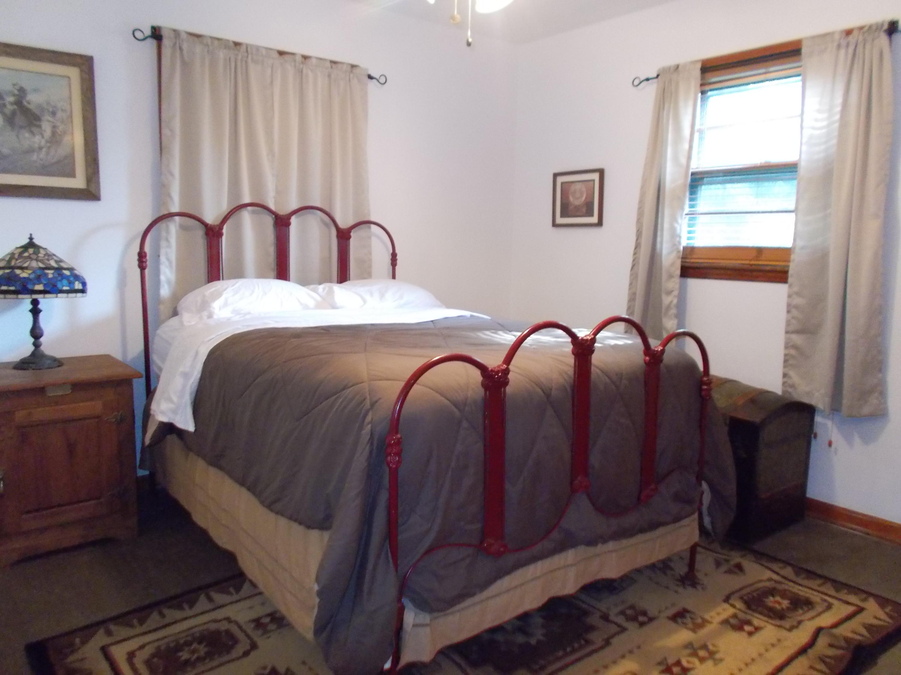 3741 Flatwoods Road Elliston, VA 24087 - Photo 23 of 51 a bedroom with bed and a window