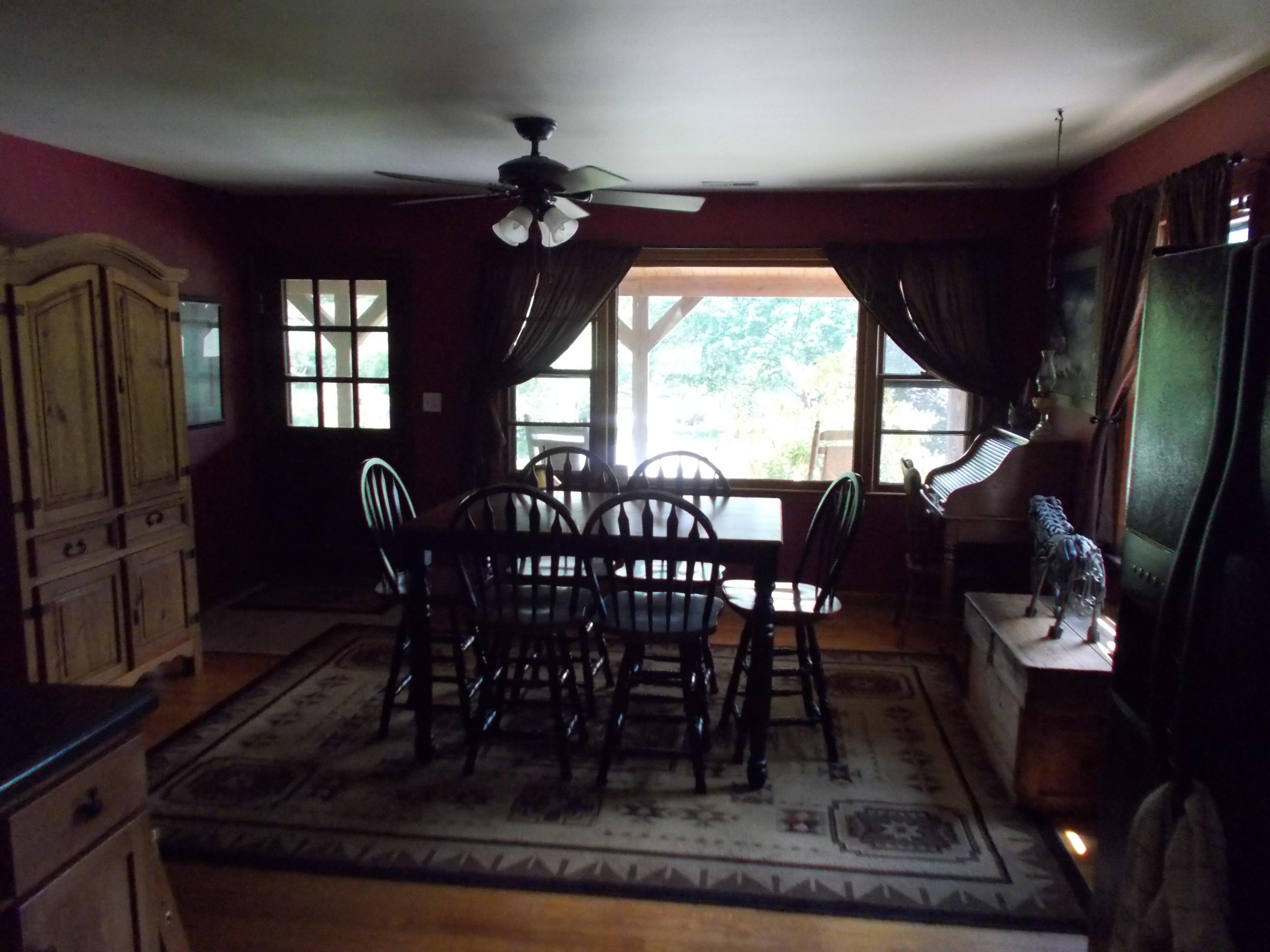 3741 Flatwoods Road Elliston, VA 24087 - Photo 34 of 51 a view of a dining room with furniture window and outside view