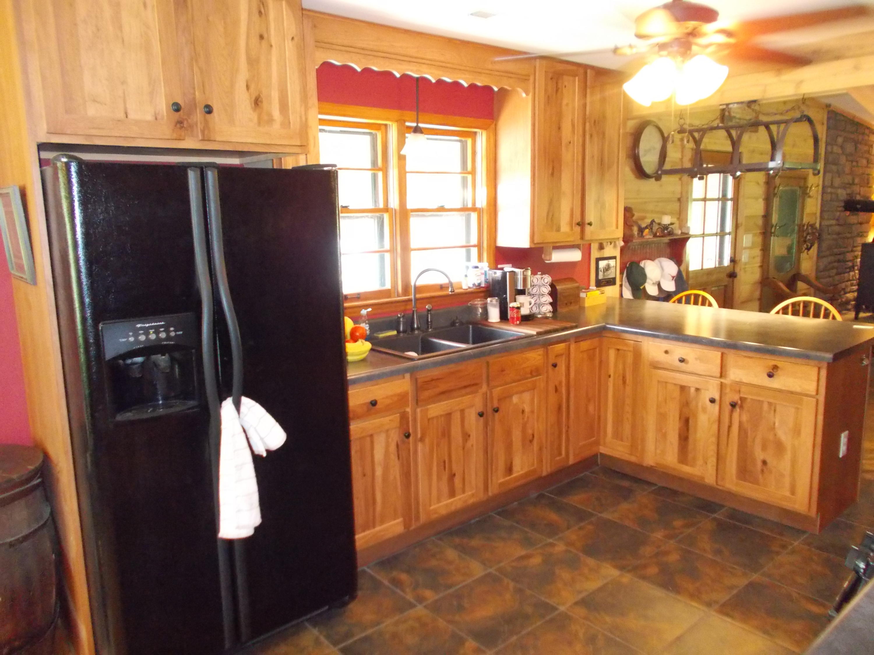 3741 Flatwoods Road Elliston, VA 24087 - Photo 35 of 51 a kitchen with stainless steel appliances granite countertop a refrigerator and a stove