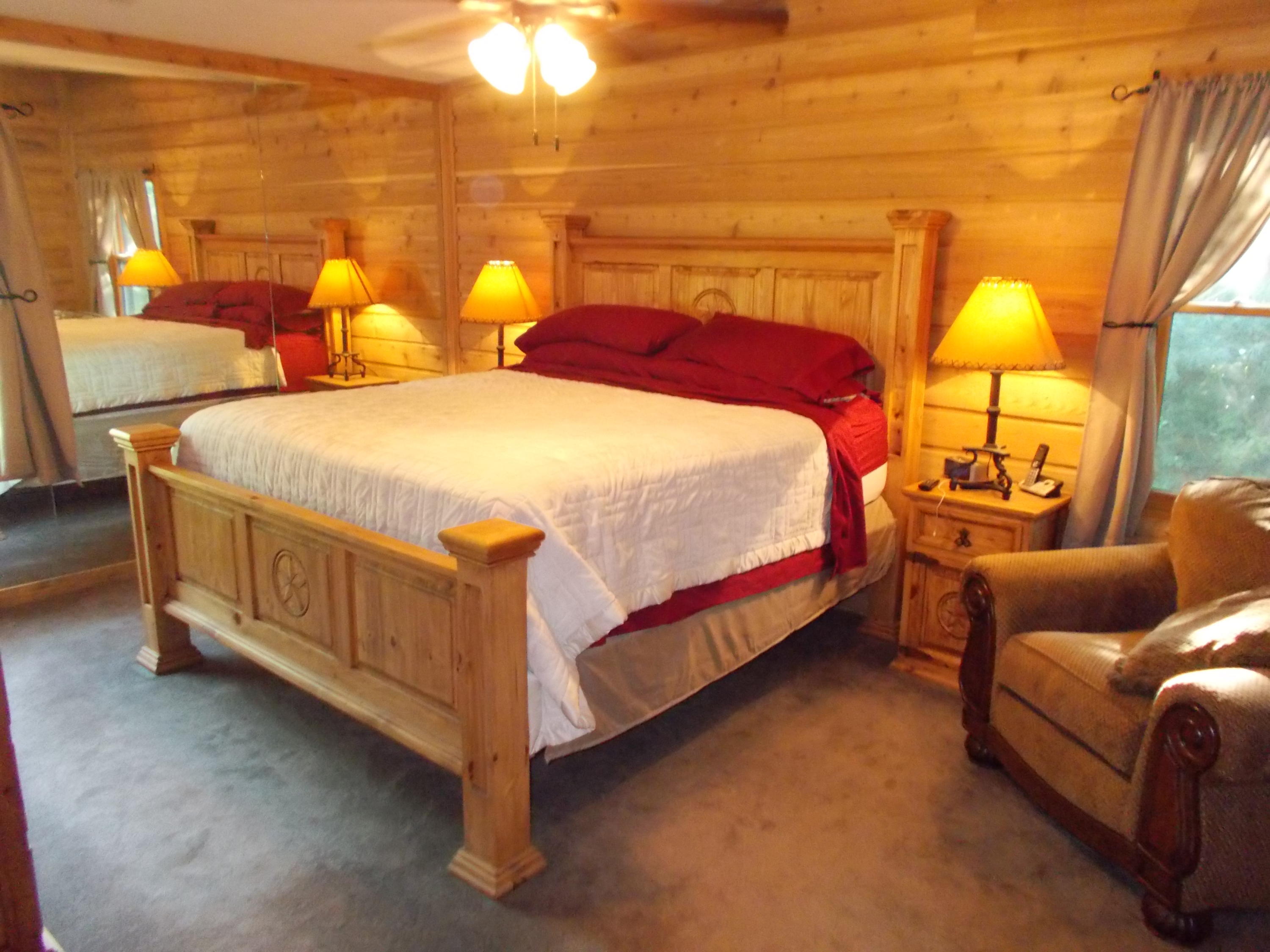 3741 Flatwoods Road Elliston, VA 24087 - Photo 41 of 51 a bed sitting in a bedroom next to a lamp