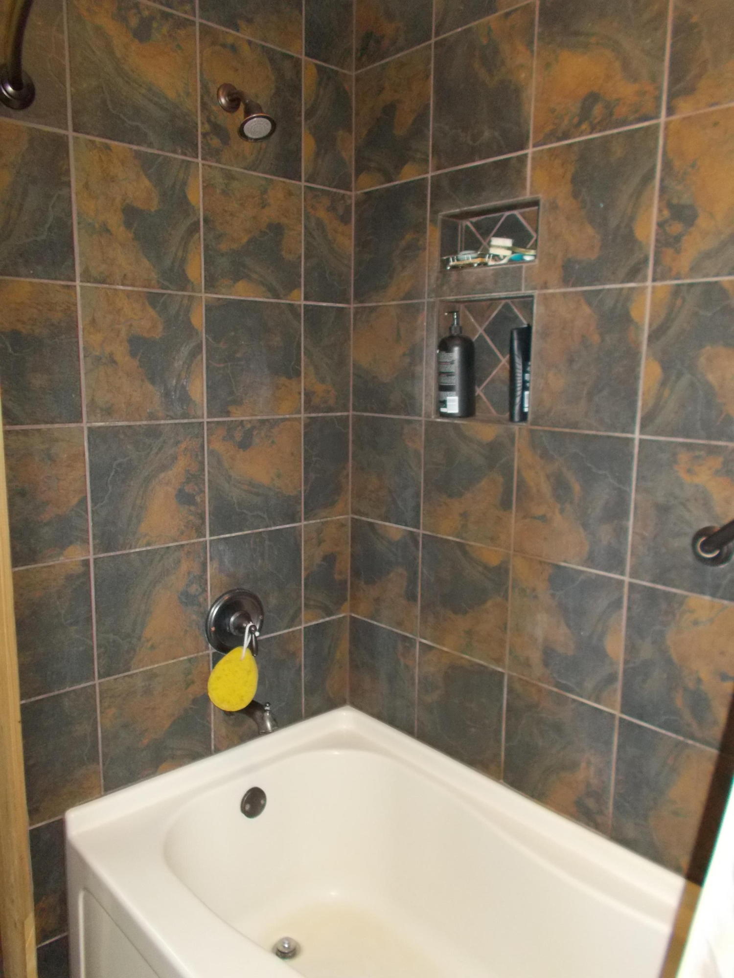 3741 Flatwoods Road Elliston, VA 24087 - Photo 42 of 51 a bathroom with a bath tub