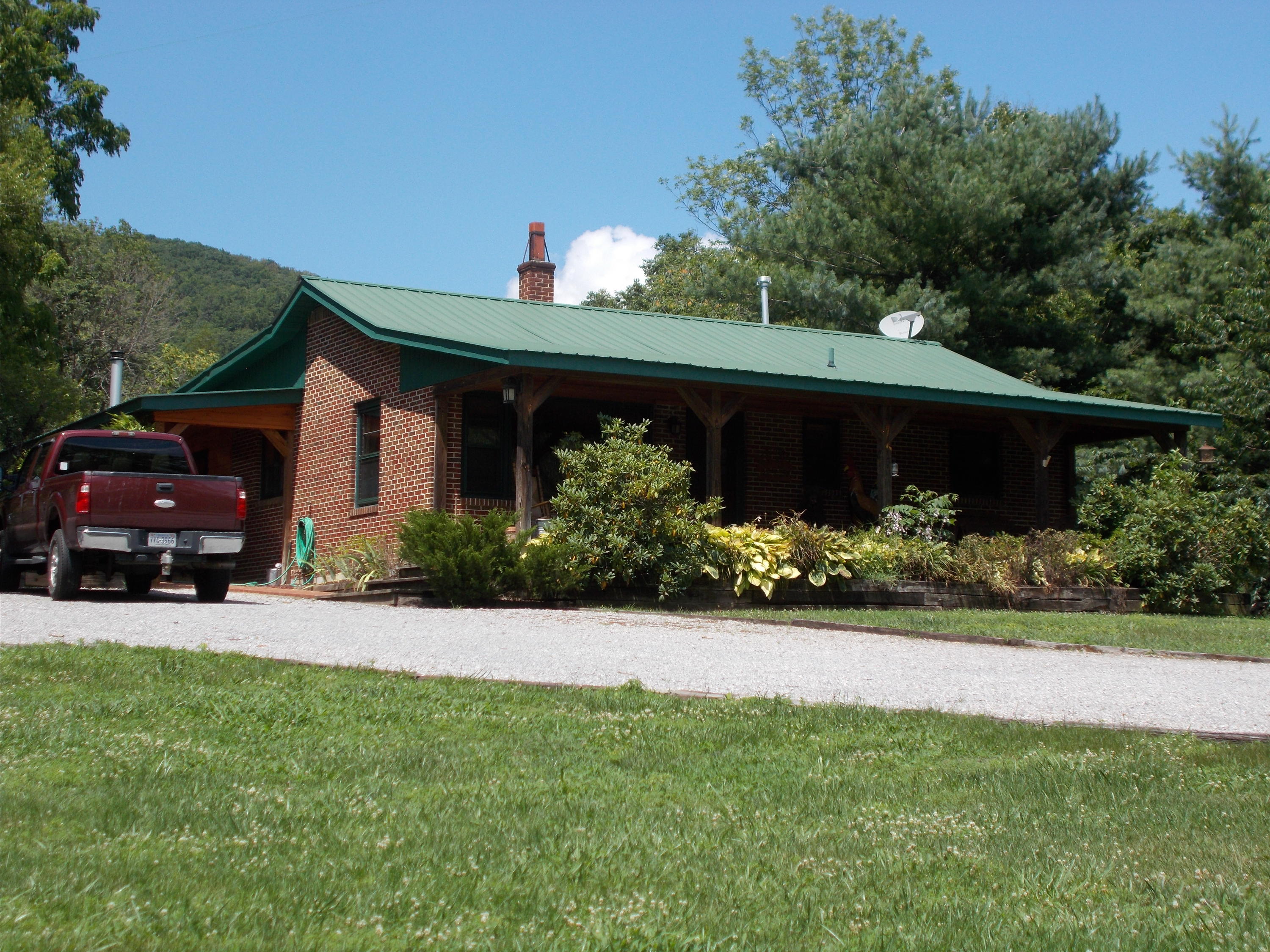 3741 Flatwoods Road Elliston, VA 24087 - Photo 49 of 51 a front view of a house with a yard