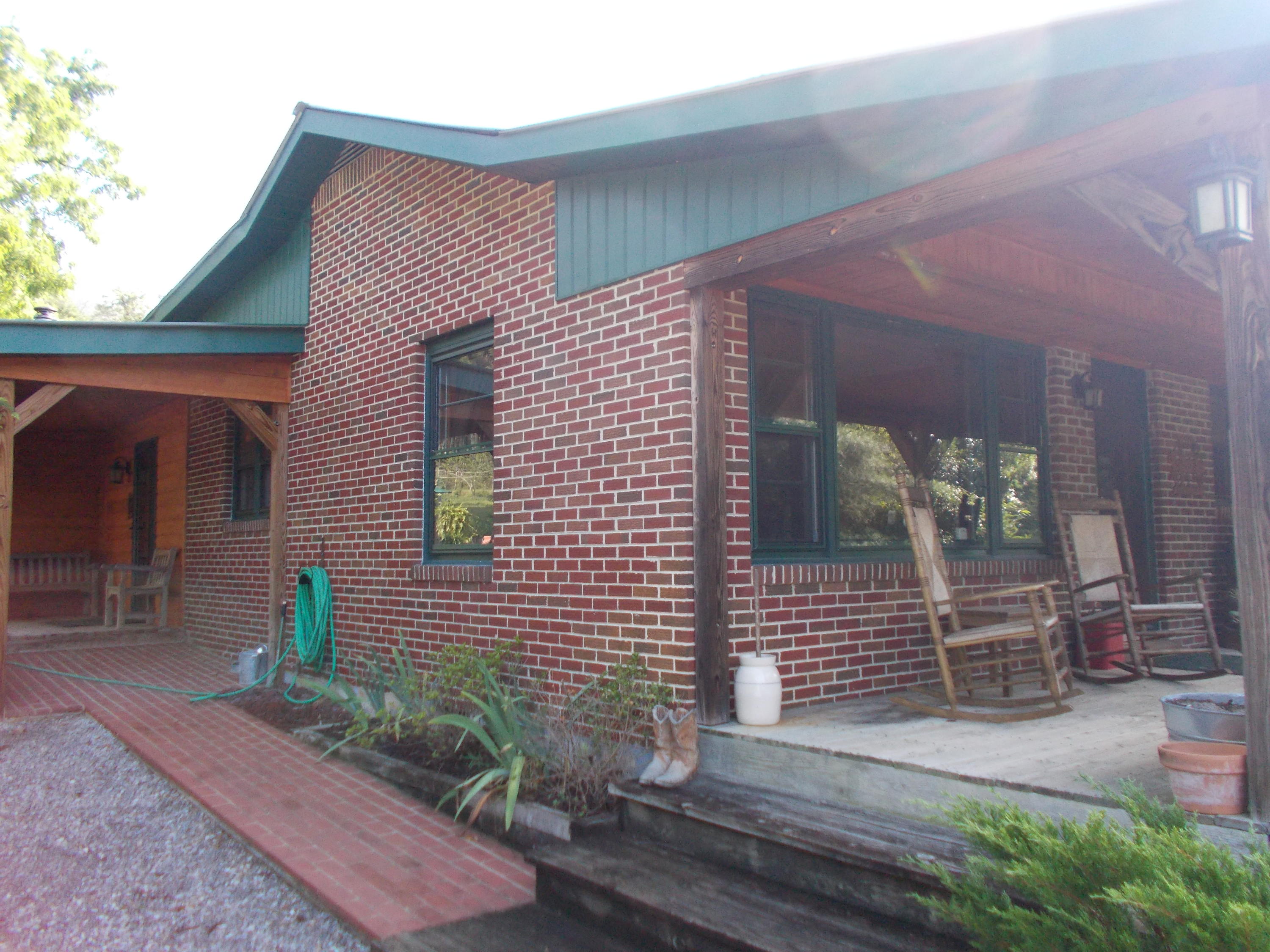 3741 Flatwoods Road Elliston, VA 24087 - Photo 6 of 51 a front view of a house with garden