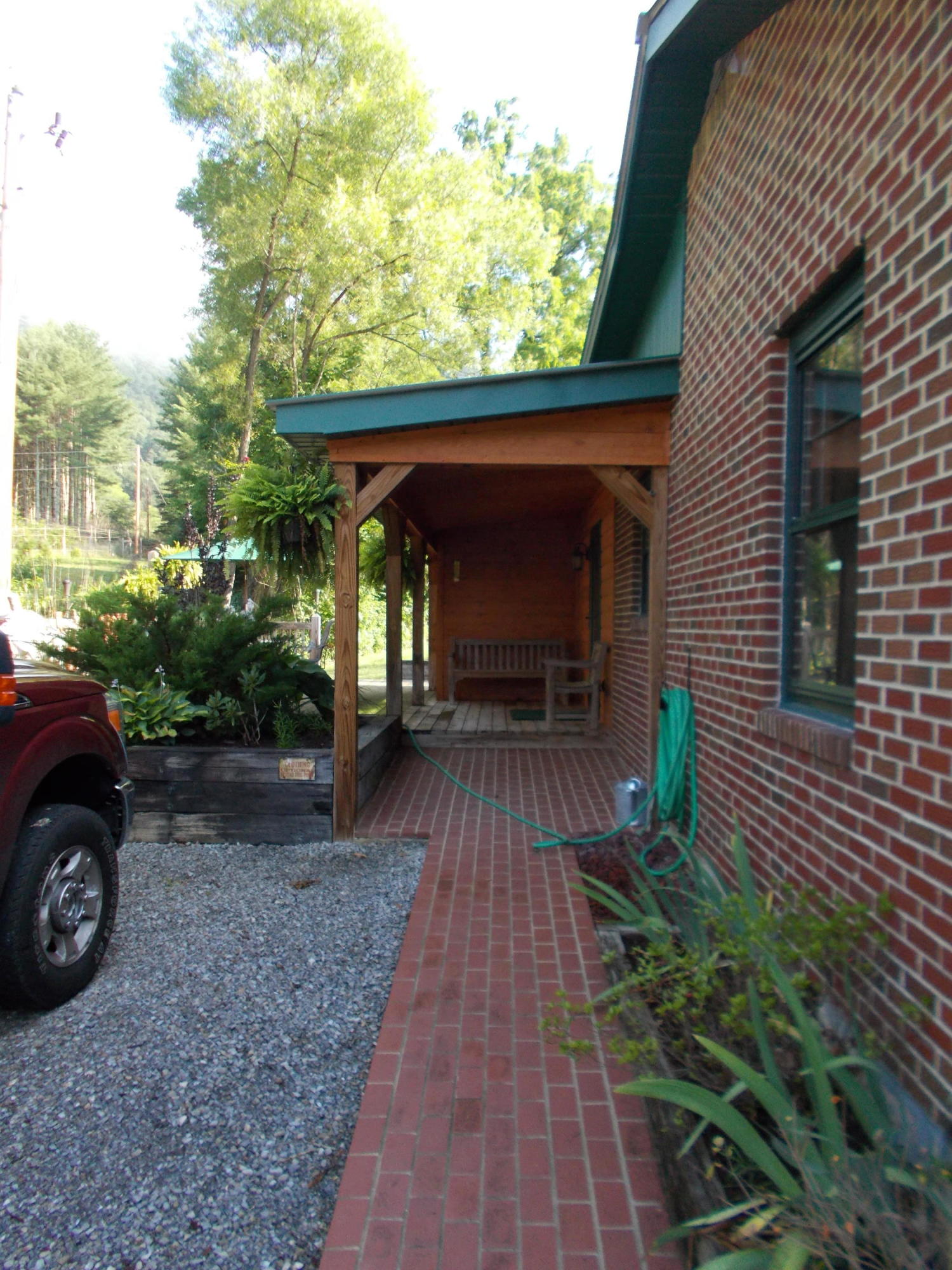 3741 Flatwoods Road Elliston, VA 24087 - Photo 8 of 51 a front view of a house with garden