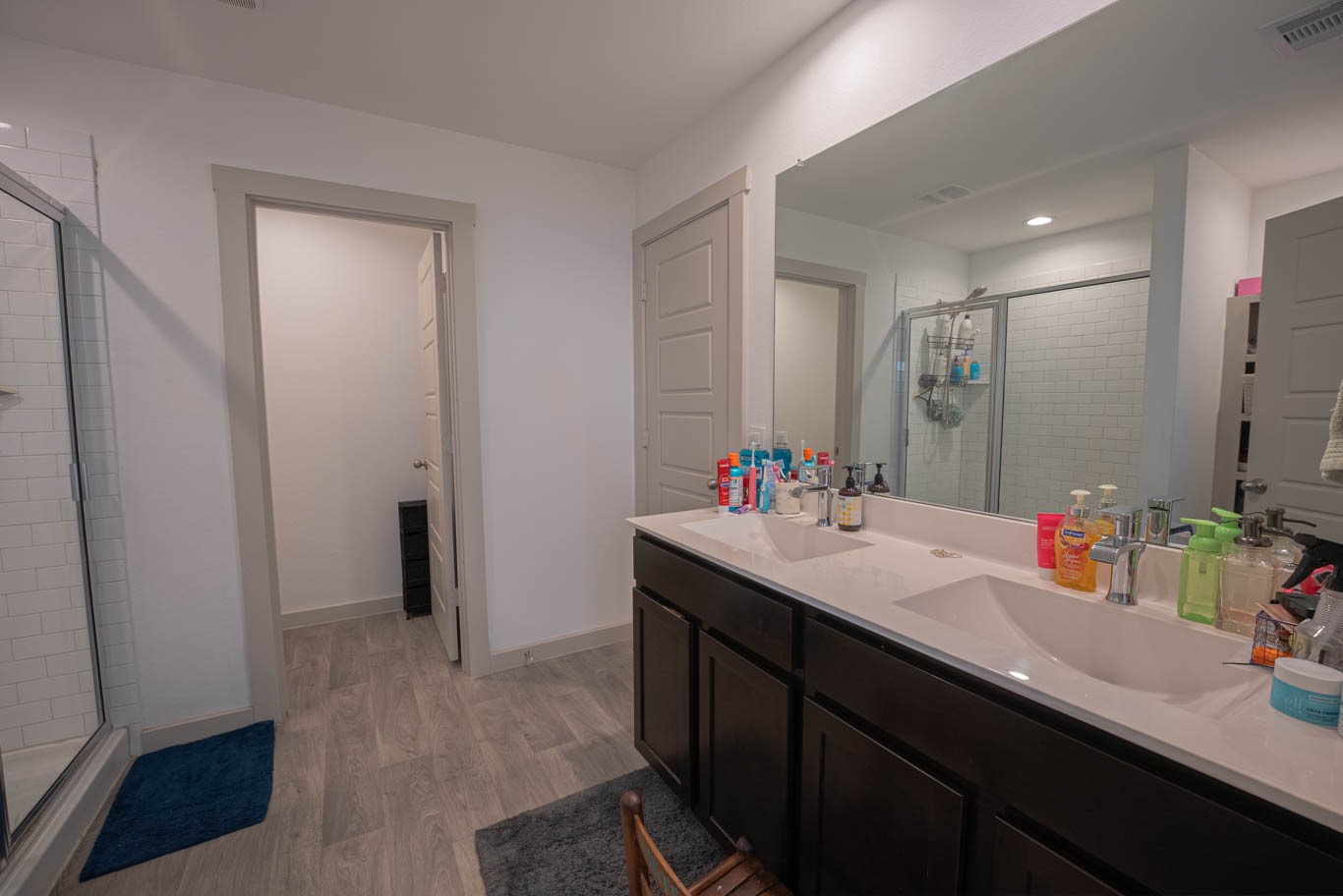 12732 Basinghall Lane Houston, TX 77047 - Photo 14 of 20 a bathroom with a sink double vanity and a mirror