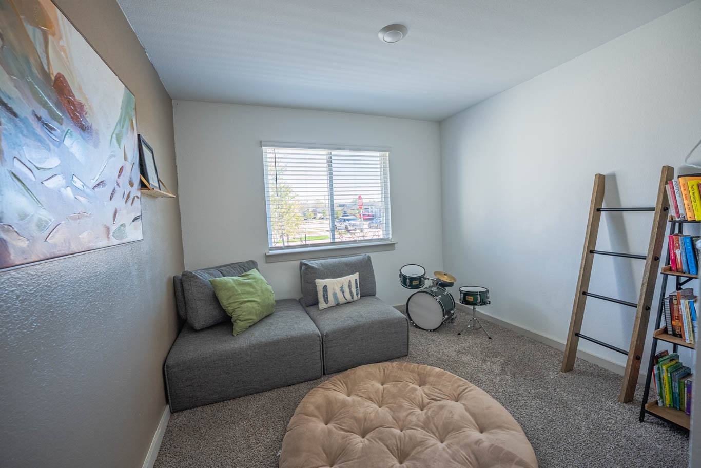 12732 Basinghall Lane Houston, TX 77047 - Photo 15 of 20 a living room with furniture and a floor to ceiling window