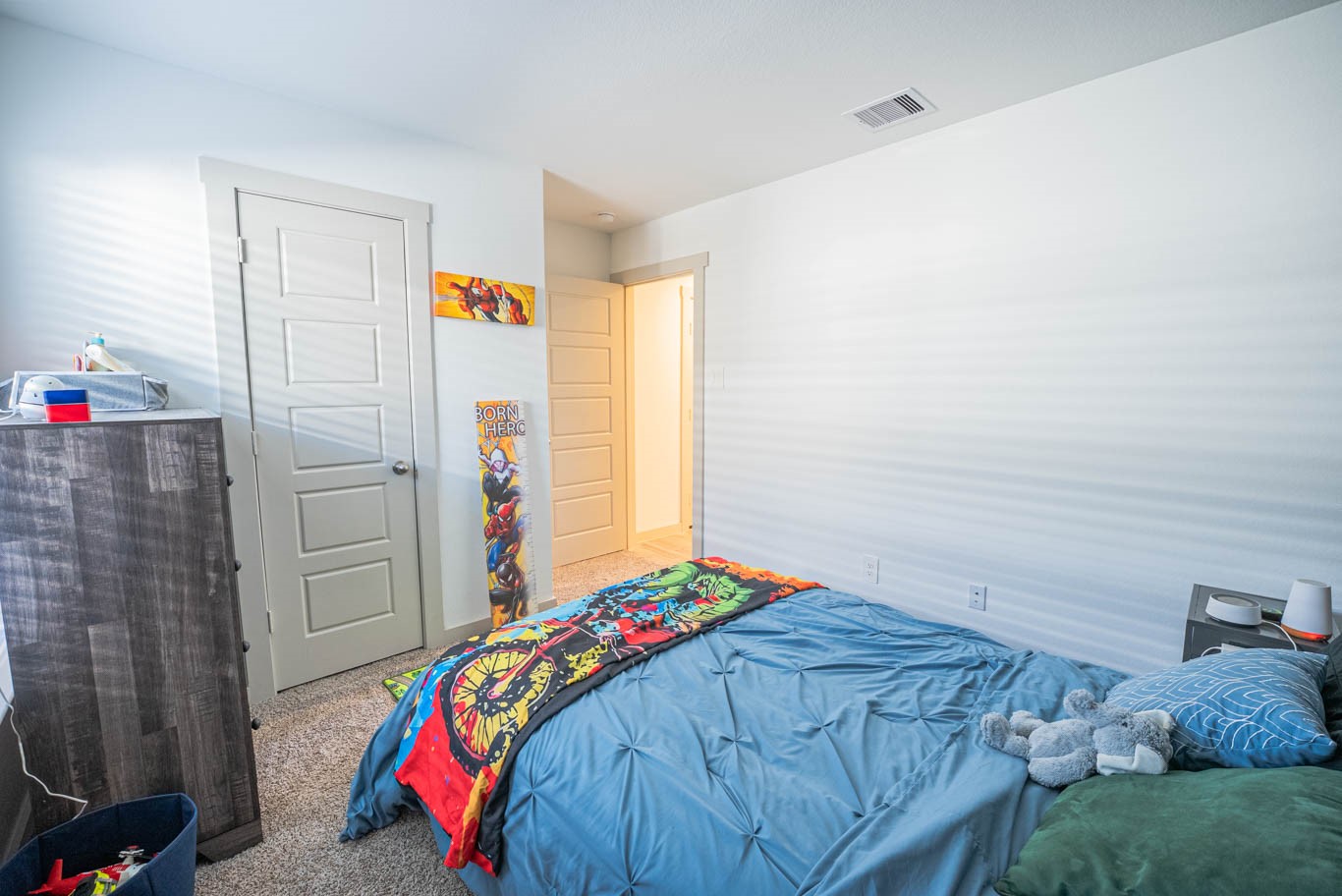 12732 Basinghall Lane Houston, TX 77047 - Photo 18 of 20 a bedroom with a bed and a window