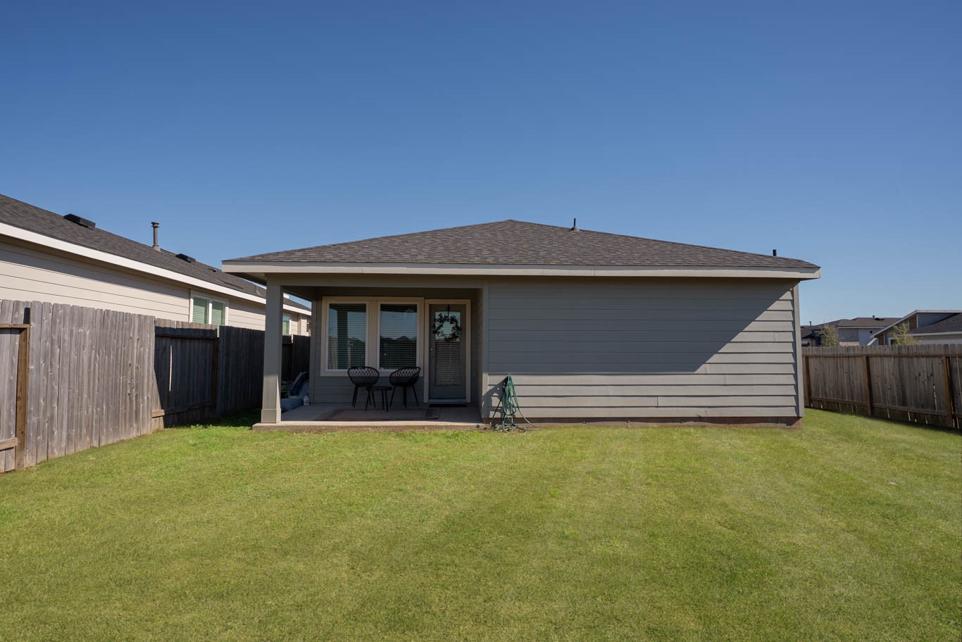 12732 Basinghall Lane Houston, TX 77047 - Photo 19 of 20 a view of a house with a yard and garage