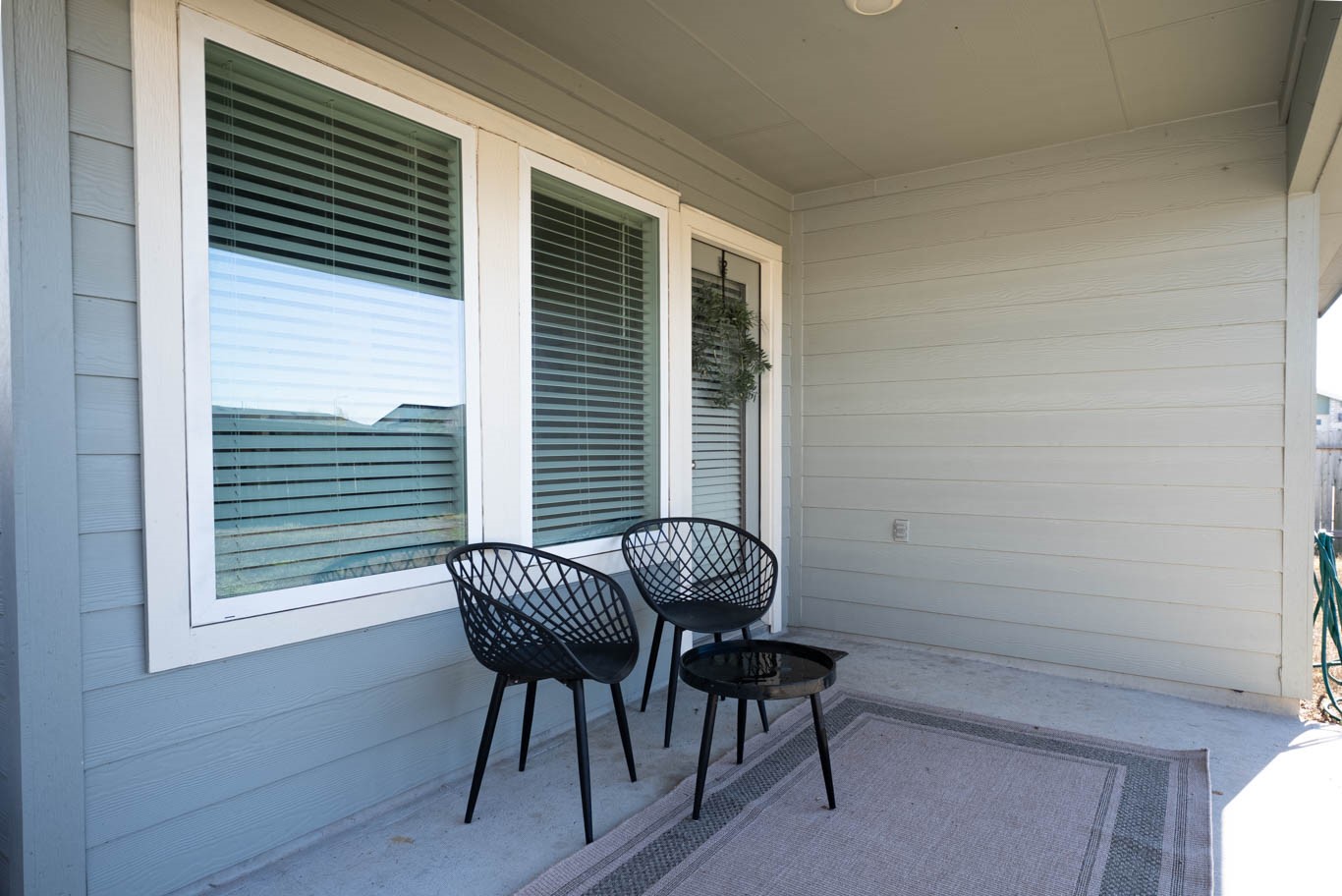 12732 Basinghall Lane Houston, TX 77047 - Photo 20 of 20 a view of a workspace with furniture and a window