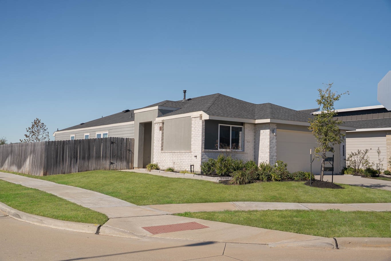 12732 Basinghall Lane Houston, TX 77047 - Photo 2 of 20 a view of a house with a big yard plants and large tree
