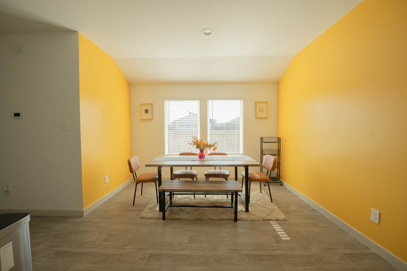 12732 Basinghall Lane Houston, TX 77047 - Photo 3 of 20 a dining room with a table and chairs