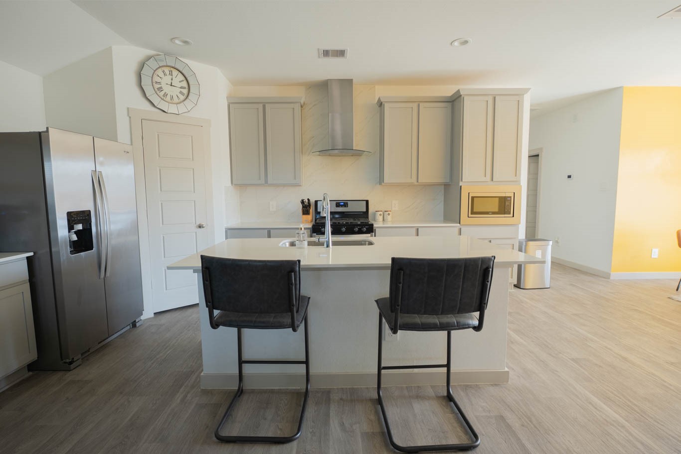 12732 Basinghall Lane Houston, TX 77047 - Photo 7 of 20 a kitchen with stainless steel appliances granite countertop a refrigerator and a stove top oven