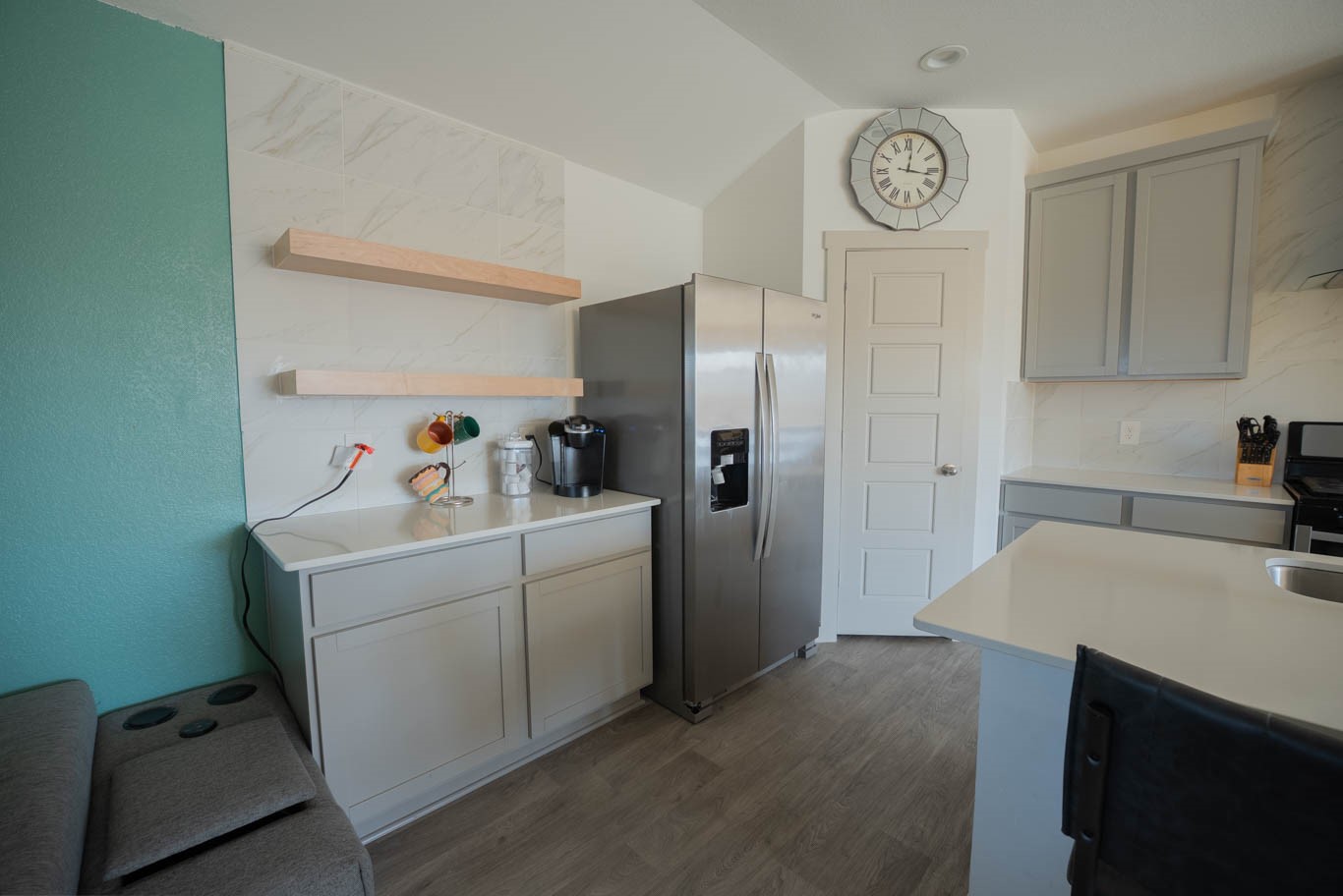 12732 Basinghall Lane Houston, TX 77047 - Photo 8 of 20 a utility room with cabinets washer and dryer