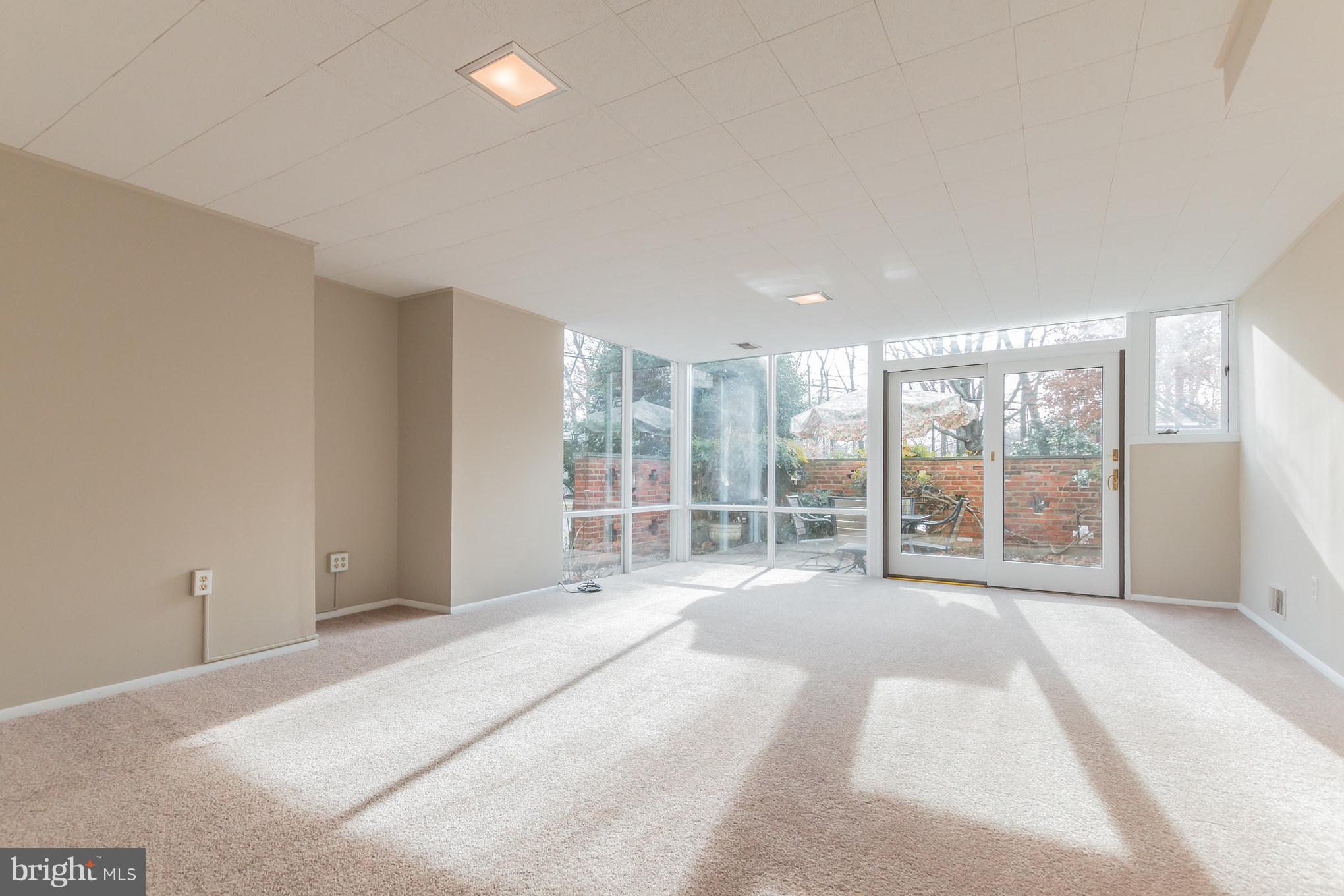 1100 La Grande Road Silver Spring, MD 20903 - Photo 21 of 30 Family room lower level, exits to private patio