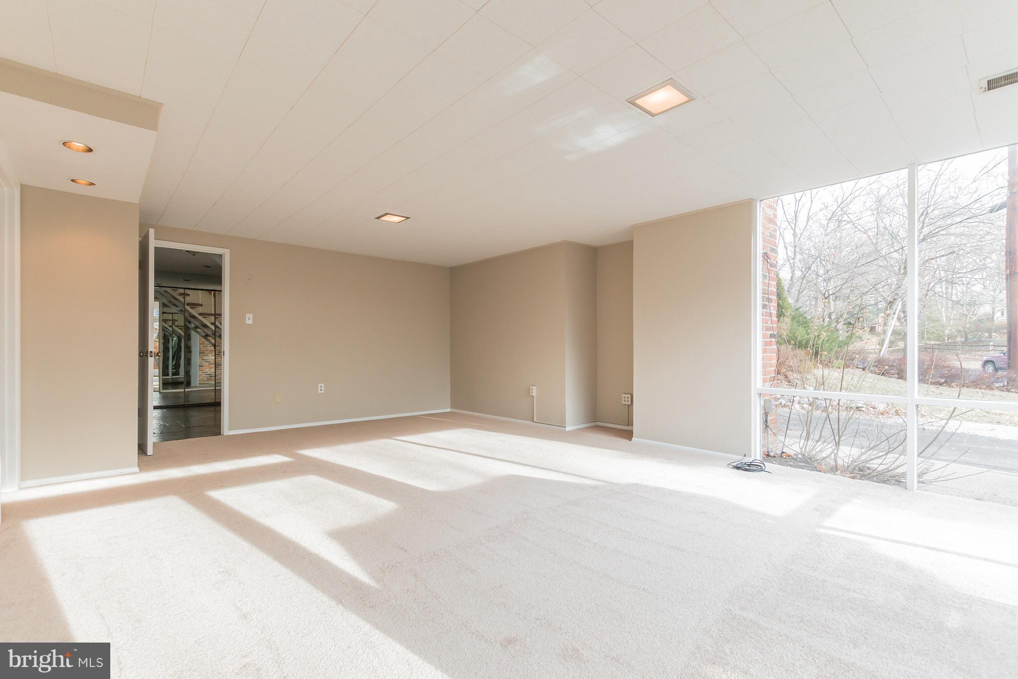 1100 La Grande Road Silver Spring, MD 20903 - Photo 22 of 30 Family room lower level towards foyer