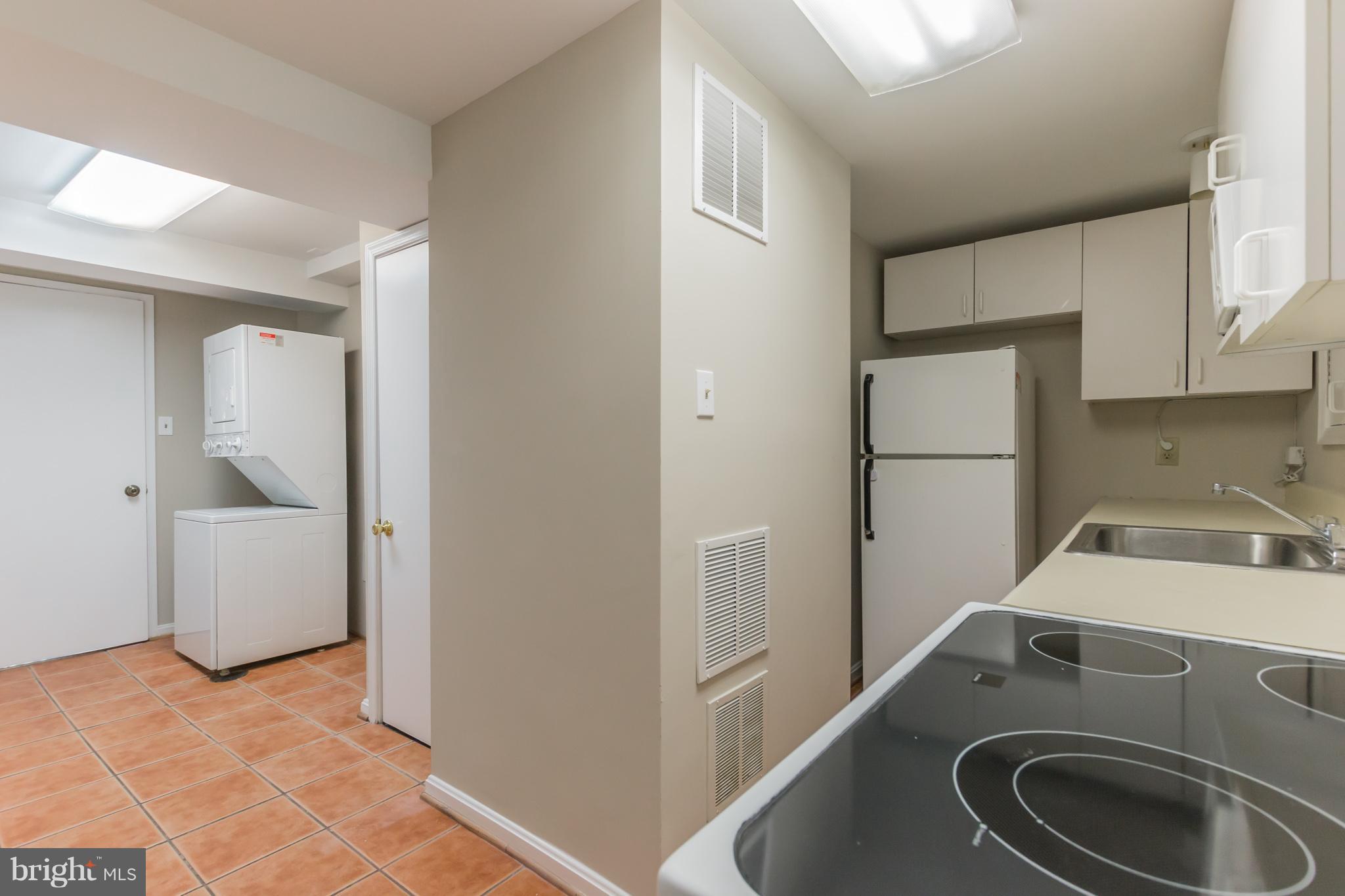 1100 La Grande Road Silver Spring, MD 20903 - Photo 25 of 30 Kitchen- lower level, showing washer/dryer