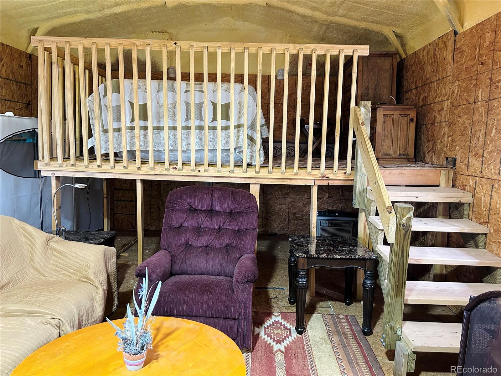 4535 Sarnoff Road Fort Garland, CO 81133 - Photo 11 of 44 a view of a chairs and table in kitchen