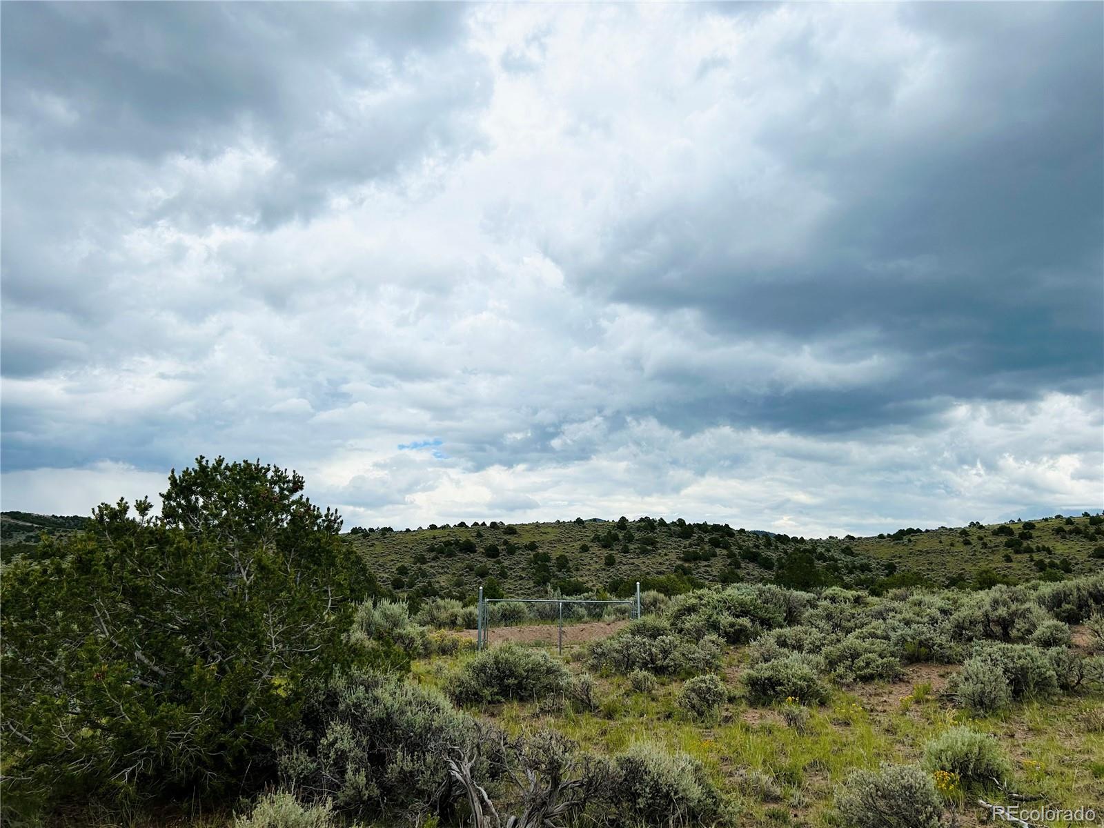 4535 Sarnoff Road Fort Garland, CO 81133 - Photo 26 of 44 a view of a city and mountains