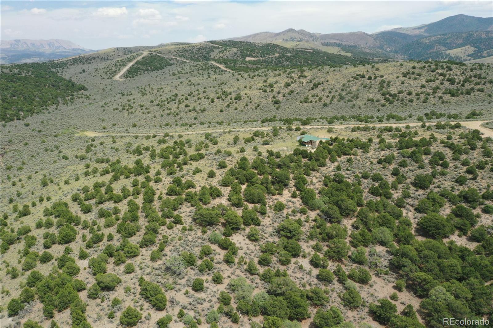4535 Sarnoff Road Fort Garland, CO 81133 - Photo 32 of 44 a view of a mountain with a outdoor space