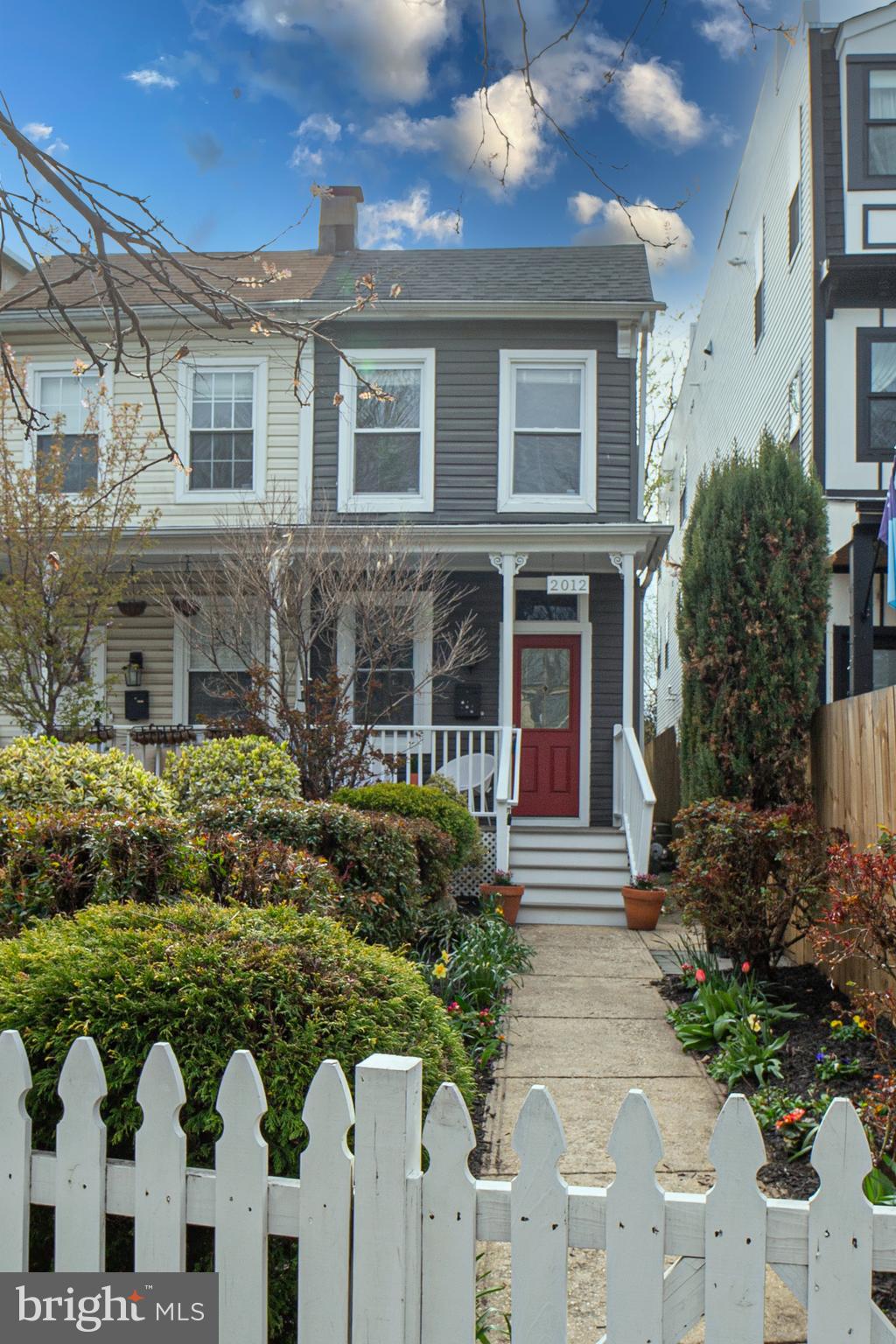 2012 2nd Street Northwest Washington, DC 20001 - Photo 2 of 28 a front view of a house with a yard