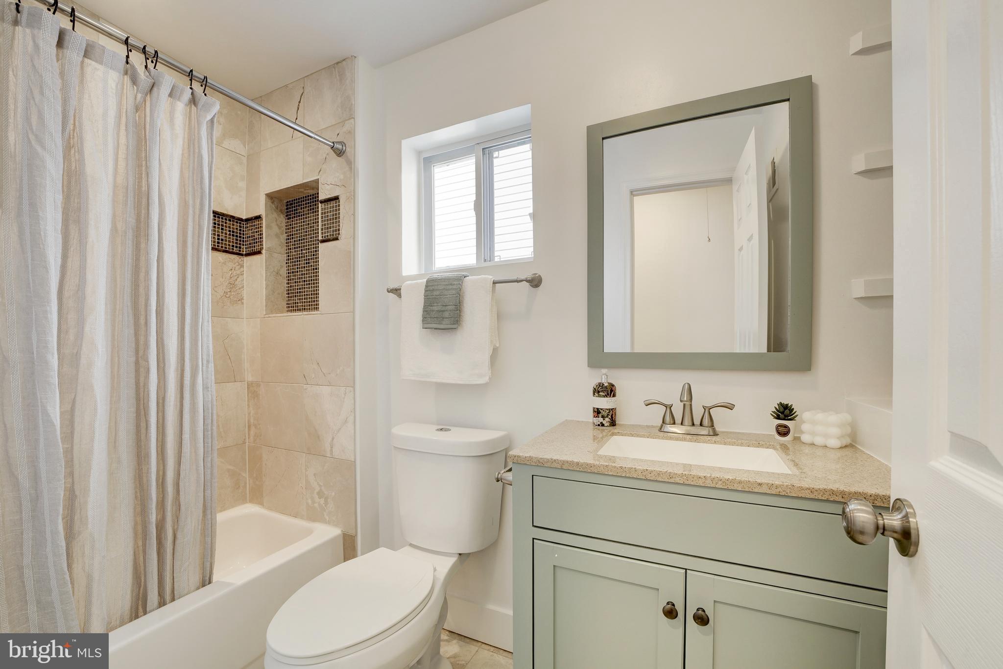 2012 2nd Street Northwest Washington, DC 20001 - Photo 22 of 28 a bathroom with a sink toilet and shower