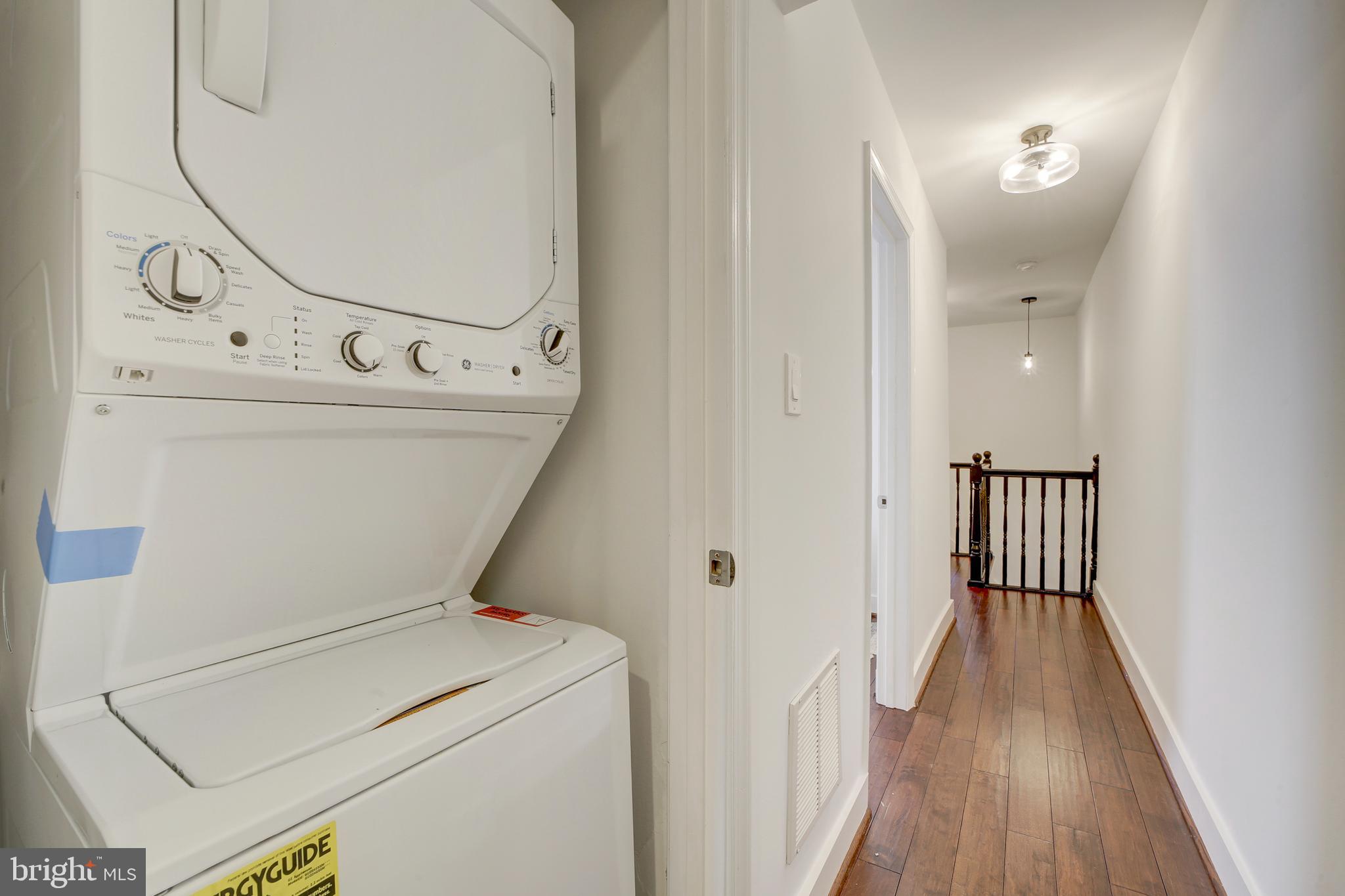 2012 2nd Street Northwest Washington, DC 20001 - Photo 24 of 28 a view of washer and dryer with wooden floor
