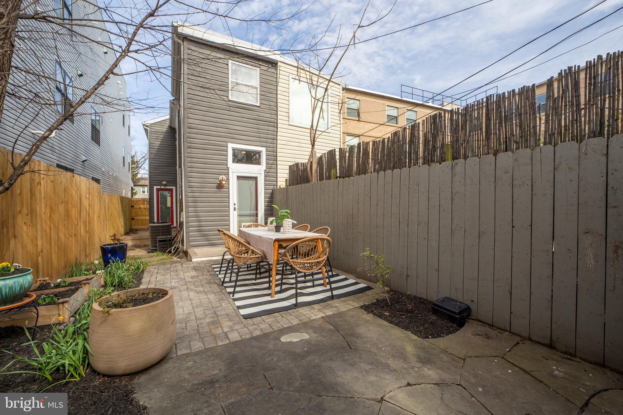2012 2nd Street Northwest Washington, DC 20001 - Photo 28 of 28 a backyard of a house with outdoor seating