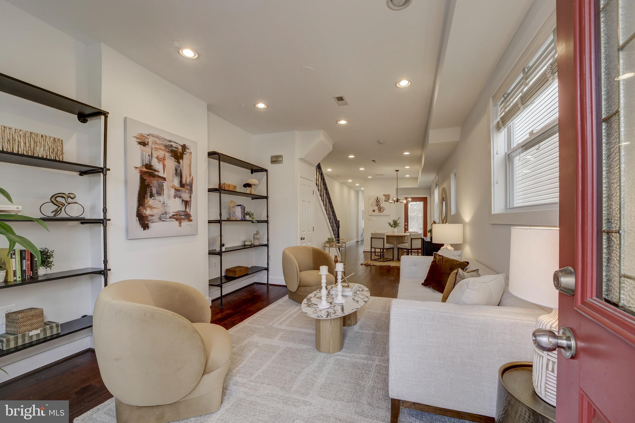 2012 2nd Street Northwest Washington, DC 20001 - Photo 4 of 28 a living room with furniture and a large window