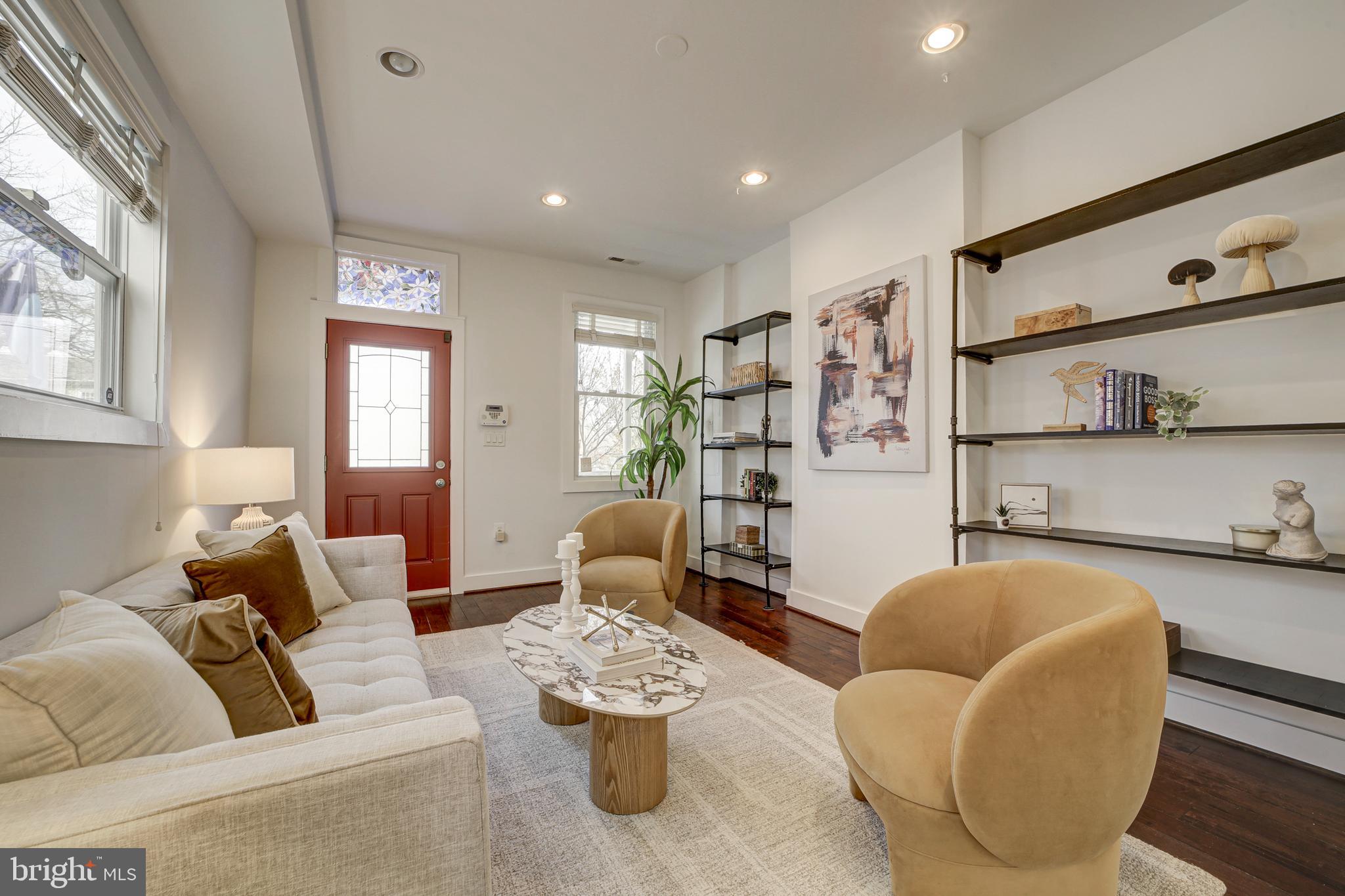 2012 2nd Street Northwest Washington, DC 20001 - Photo 7 of 28 a living room with furniture and a wooden floor