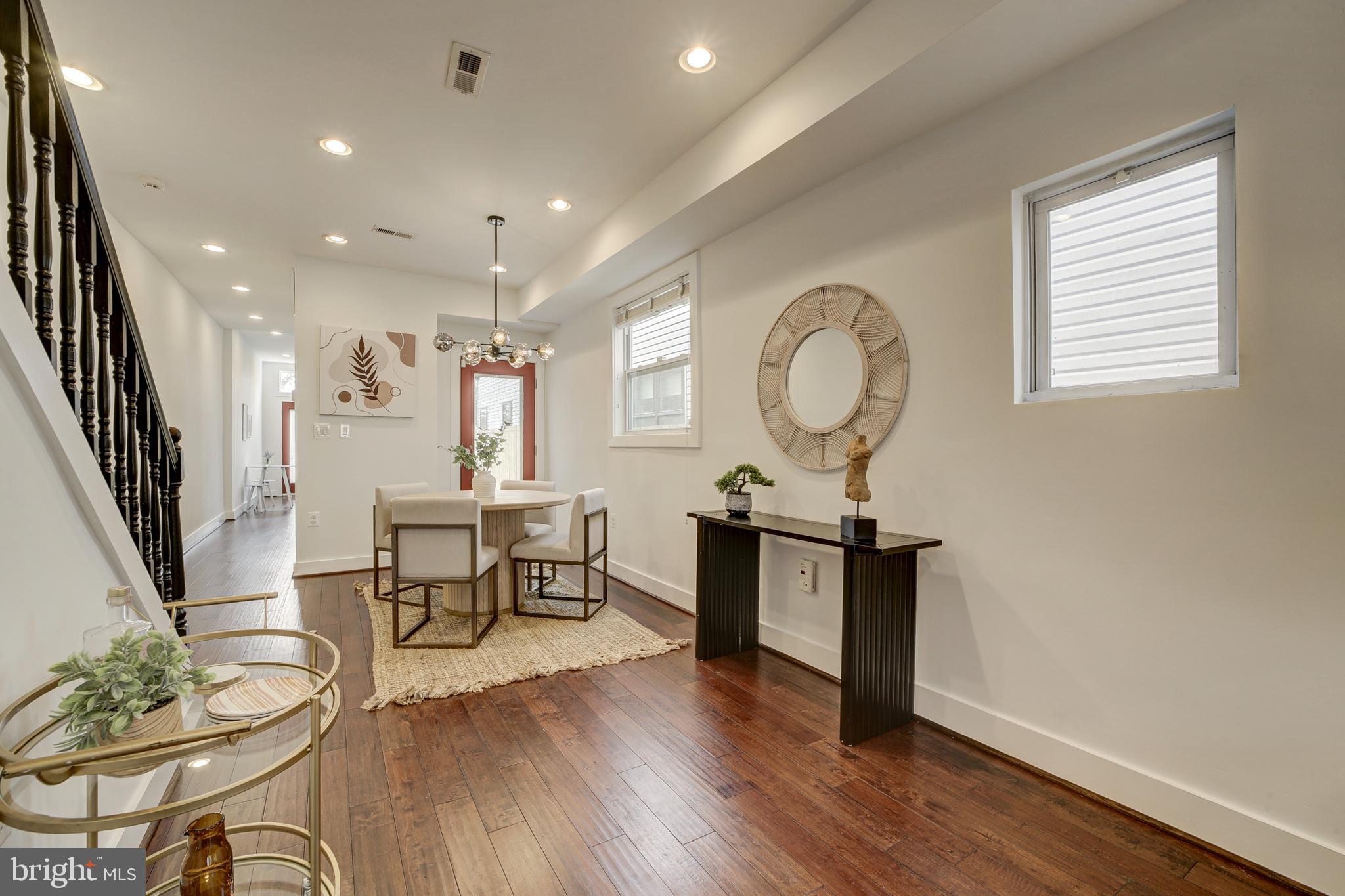 2012 2nd Street Northwest Washington, DC 20001 - Photo 9 of 28 a living room with fireplace furniture and a wooden floor