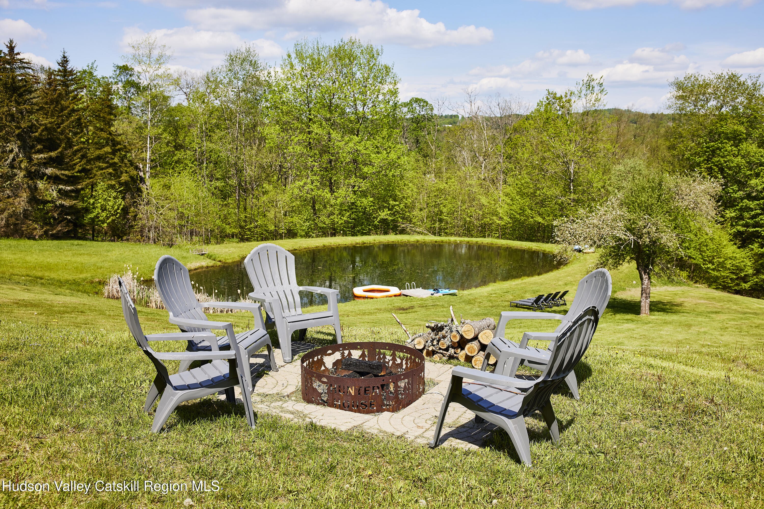 55 Hunter Road Parksville, NY 12768 - Photo 30 of 35 a roof deck with table and chairs